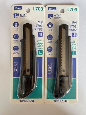 Couteau rétractable de 100 mm avec poignée ergonomique et lames en alliage SK2