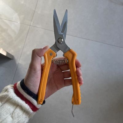 Sécateur robuste à manche orange multifonction